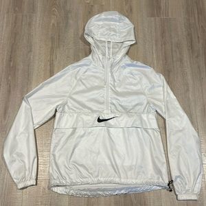 Woman’s white nike windbreaker